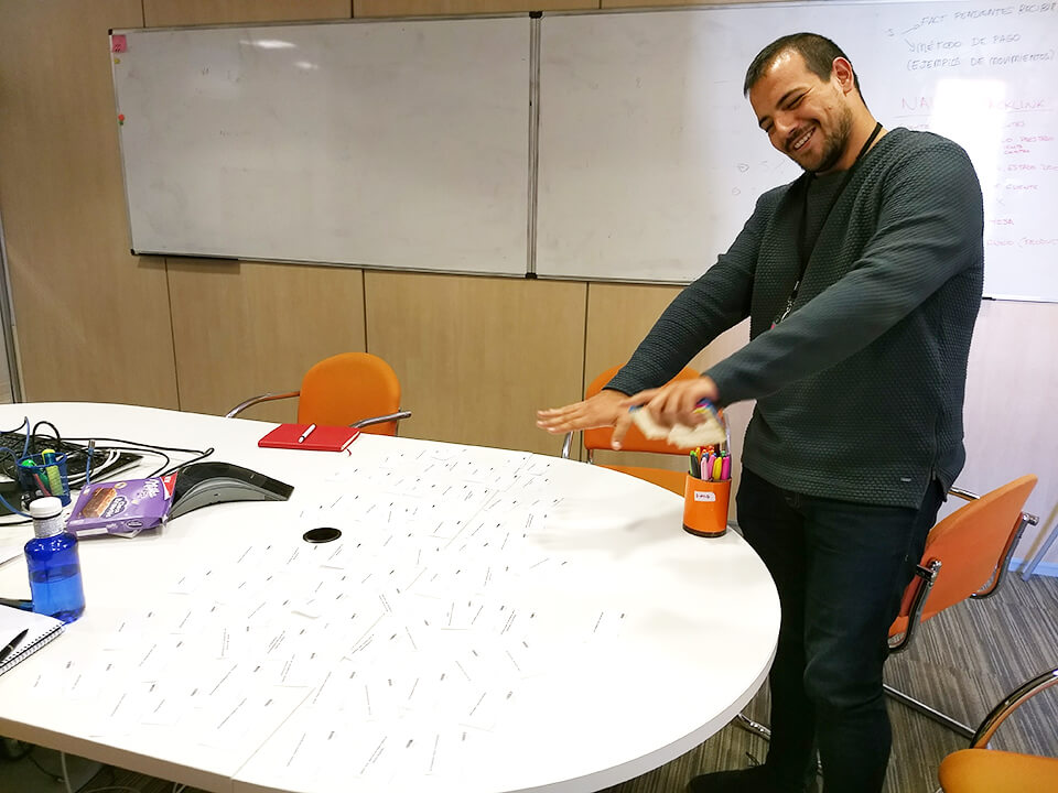A shipping expert sorting status cards