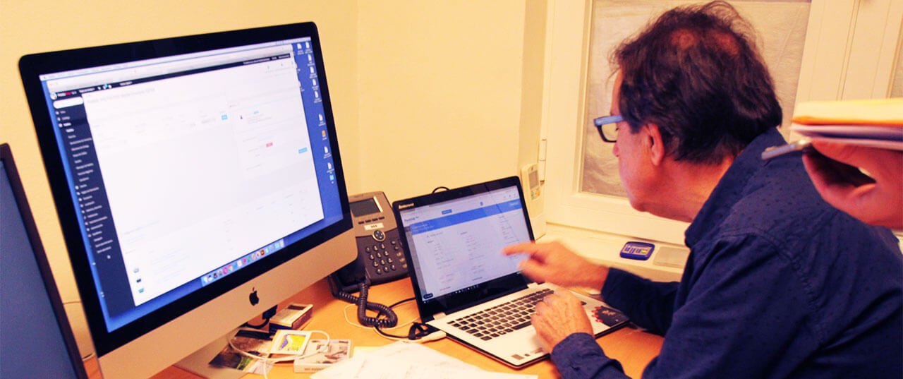 A user tracing a row with their finger